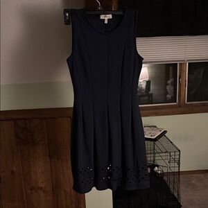 Navy Blue Sleeveless Dress with Cutout Hem